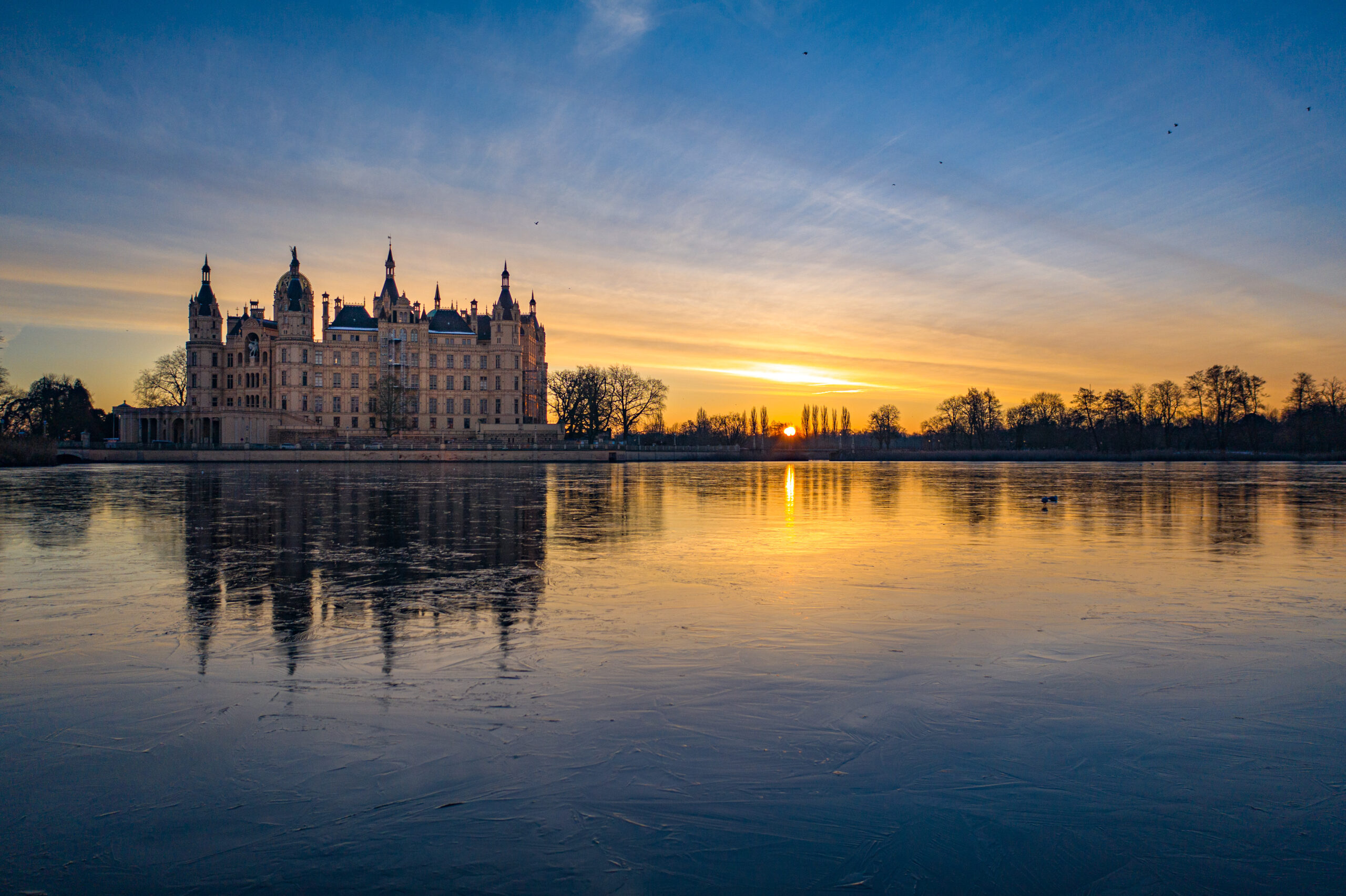 DJI_0800 a large building next to a body of water