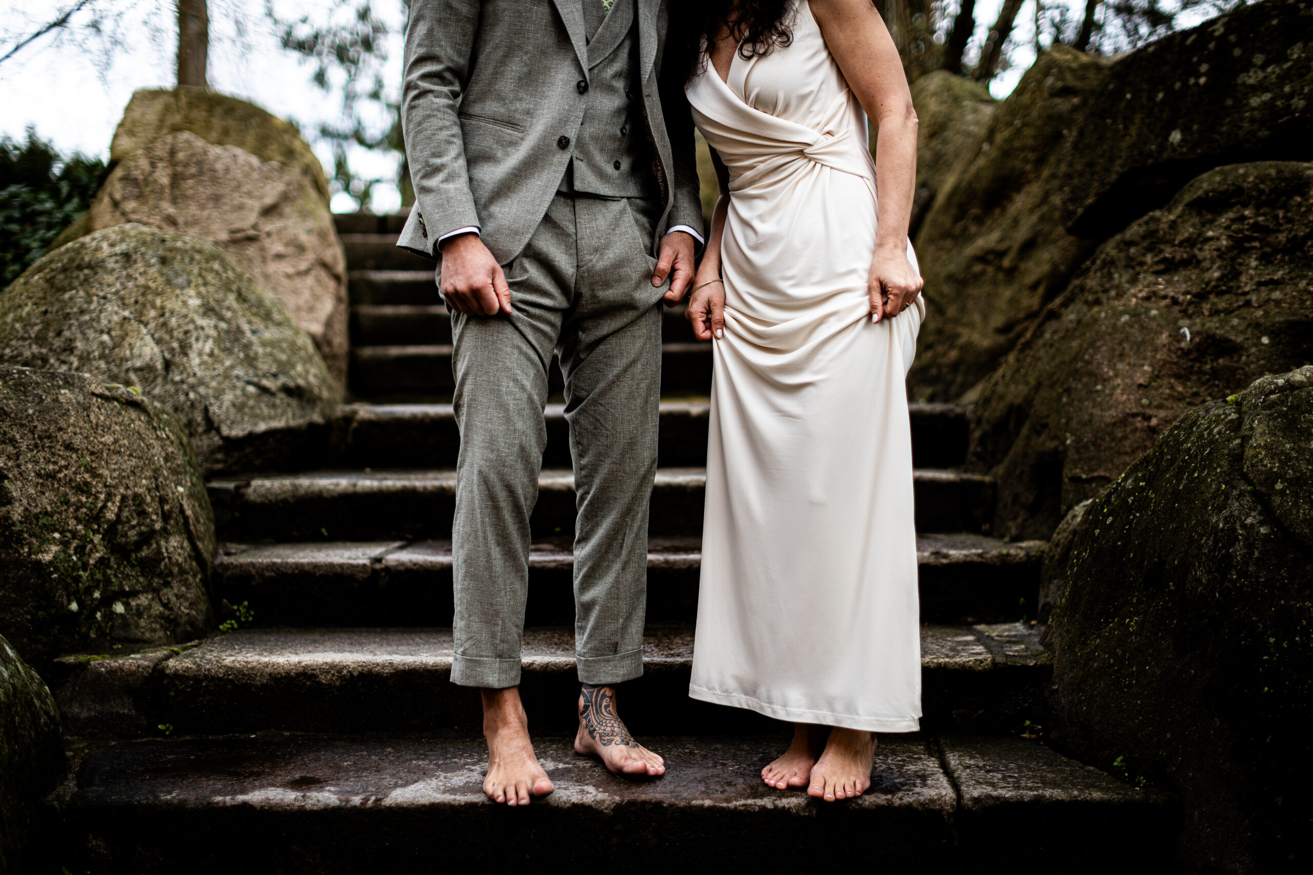 _MG_6739 a man and woman standing on stone steps