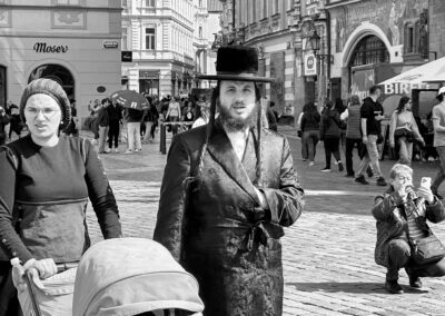 a man in a hat and coat